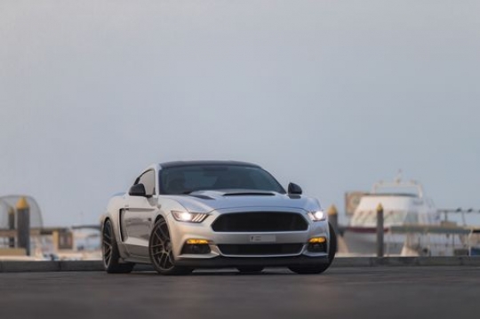 Two arab men in a parked car|-
