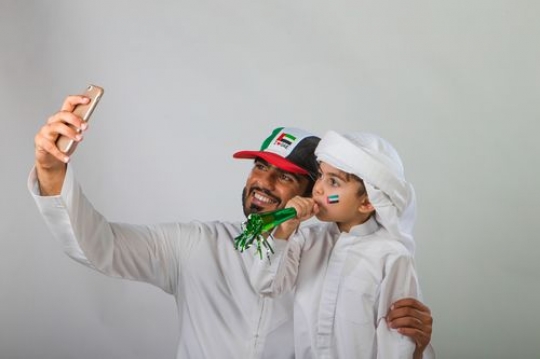 Emirati Father and Son Portrait celebrating National Day