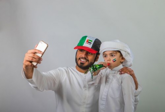 Emirati Father and Son Portrait celebrating National Day