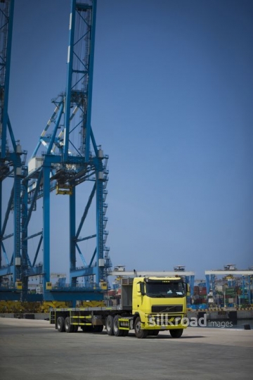 Yellow Transportation truck parked at Port|-