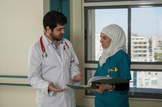 A Doctor and Nurse Discussing Medical Results