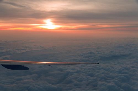 airplane wing in the horizon