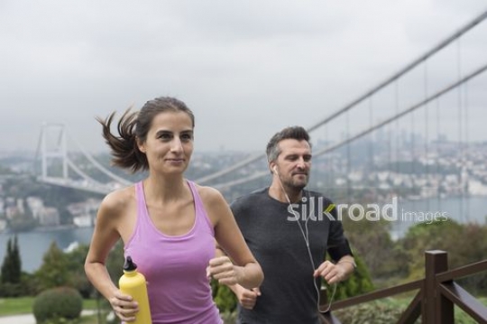 A sportive couple climbing up the stairs|Merdiven çikan sportif çift