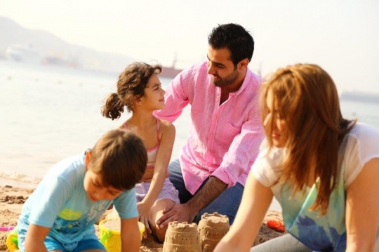 A Happy Family By The beach