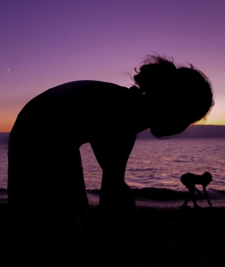 silhouette of a girl on the beach