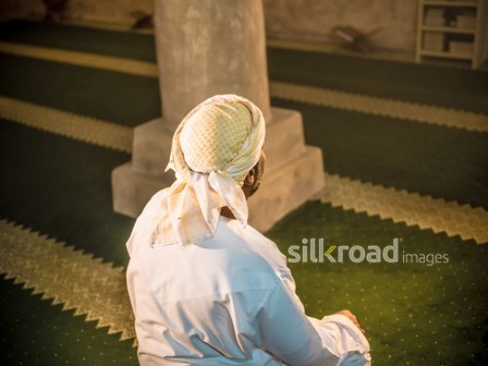 Man siting inside the mosque|-