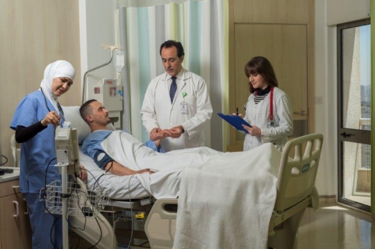 Doctors Checking on Patient at Hospital
