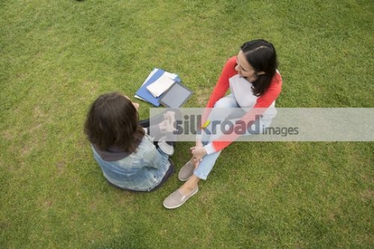 Two students sitting together|