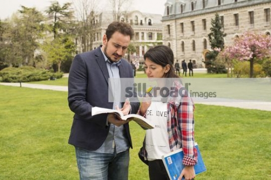 Student asking the professor questions |