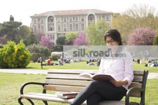 European Student reading a book|