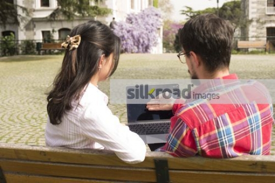 Two Students working from the laptop