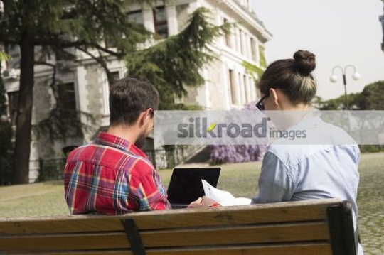 University Students sitting together on campus |