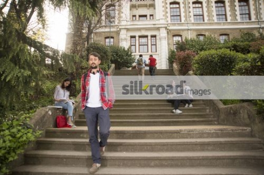 Student walking down the stairs|