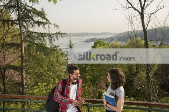 Man and woman talking to each other|