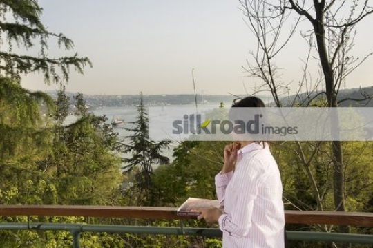 Woman standing looking at the view|