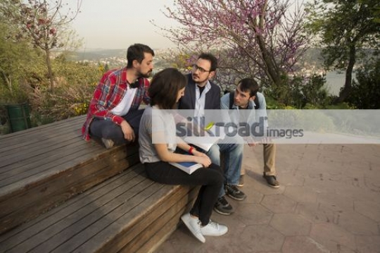 University professor talking to the students|