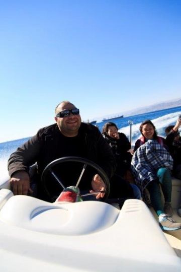 family enjoying the sea ride