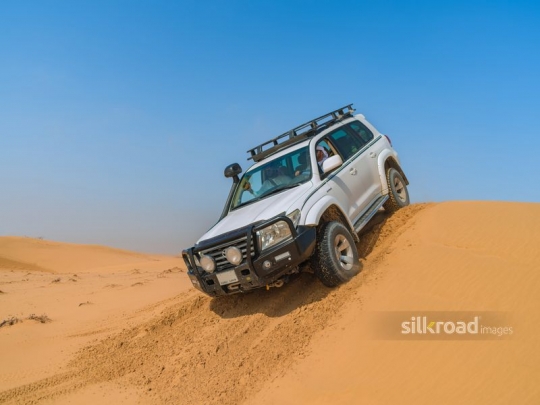 Car cruising in the desert