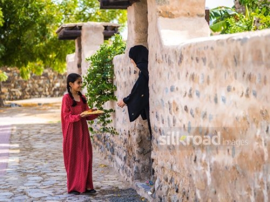 Girl visiting neighbor|-