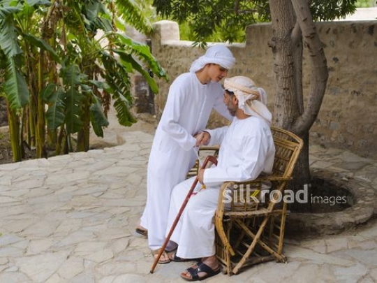 Teenager respecting grandfather|-