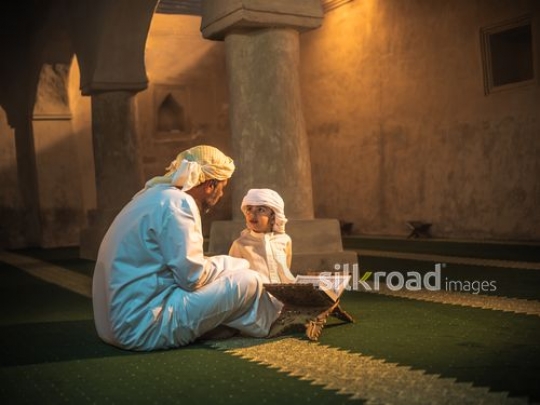 Old man enjoying time with grandson at the mosque|-
