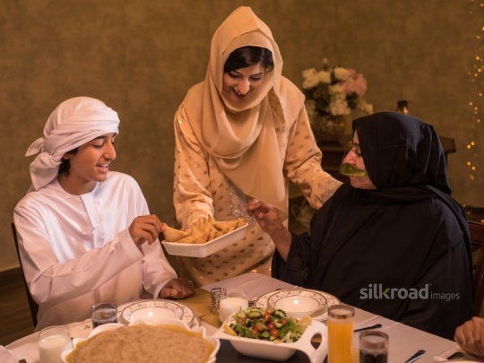 Mother serving puff pastry|-