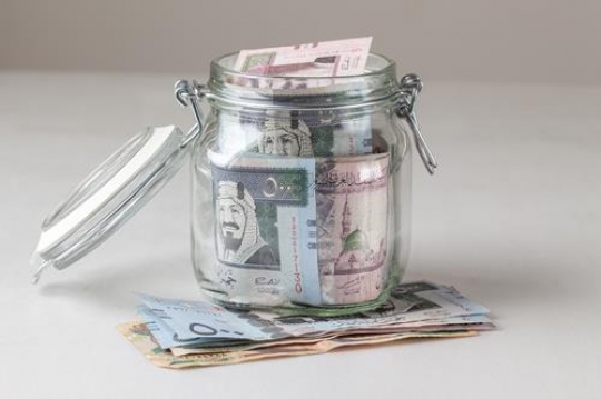 saudi arabia riyal in the glass jar