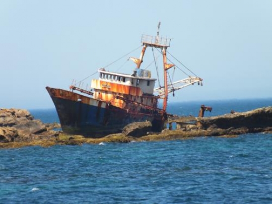 abandoned boat on a tanger bea