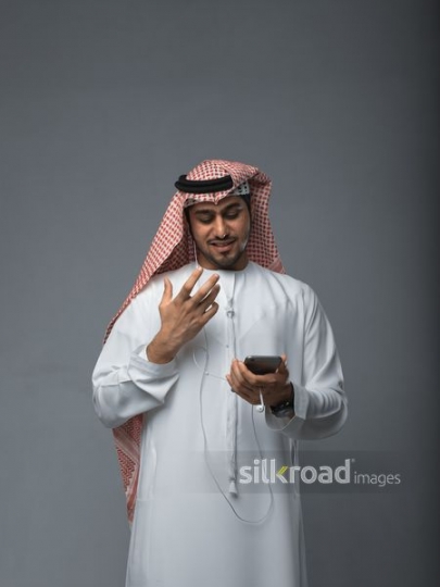 Middle Eastern man on the phone