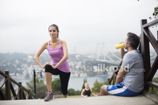 Family having rest on the stairs after sport|Spor sonrasi merdivenlerde dinlenen aile