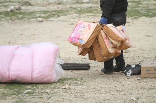 Palestinian demonstrators Distributes blankets at Bab al-Shams or Gate of the Sun in Palestine