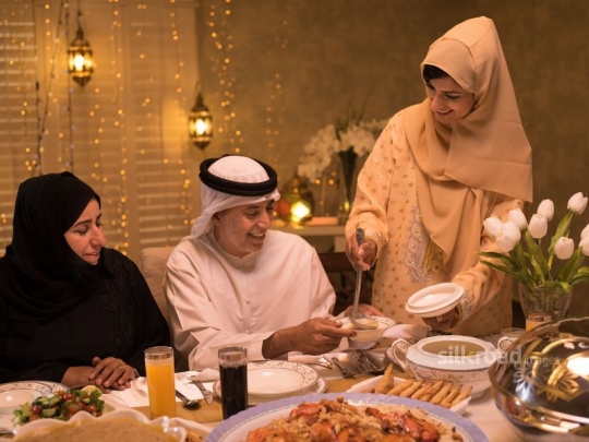 Mother serving mushroom soup|-