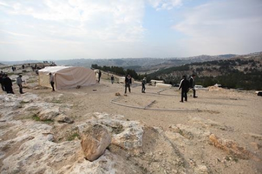 Palestinian demonstrators setting up tents at Bab al-Shams or Gate of the Sun in Arabic, in a bid to draw attention to Israeli plans to boost settlement building in the West Bank area.