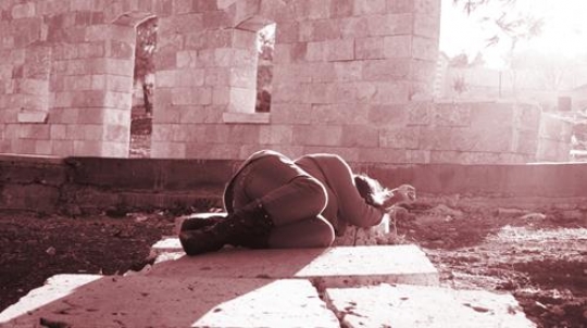 woman laying in a king hussein