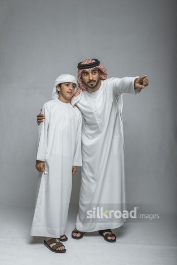 A father drawing the attention of his son