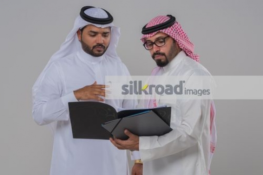 Middle Eastern Businessmen working together