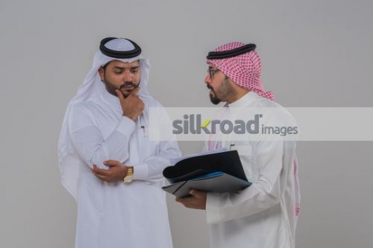 Arab men having a meeting together