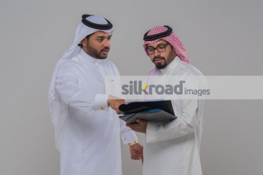 Middle Eastern men having a meeting together