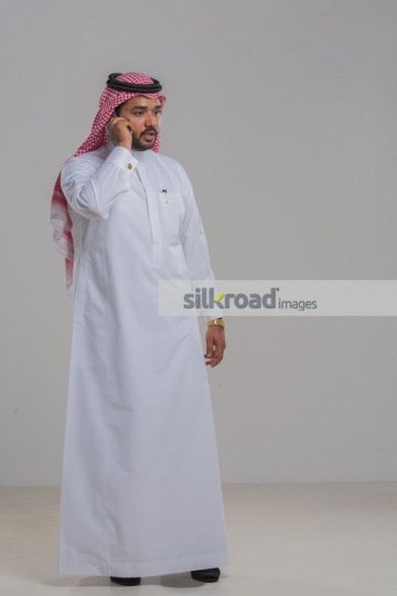 Man having a serious conversation on the phone