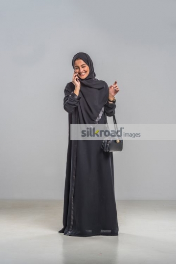 Middle Eastern Business woman talking on the phone|