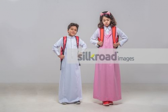 Middle Eastern kids standing next to each other