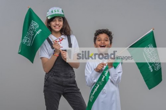 Young Arab kids celebrating their country|