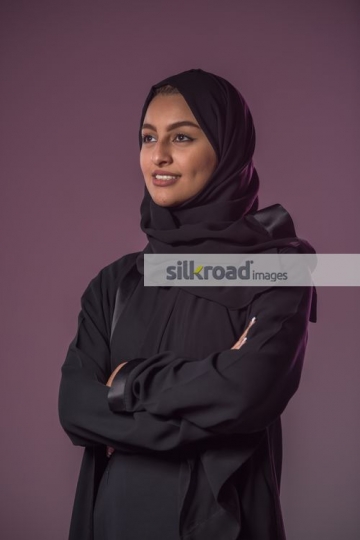 Arab woman arms crossed|