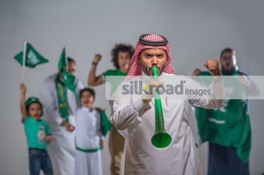 Group of people celebrating together|