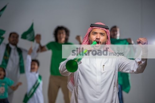 Family proudly celebrating their country|