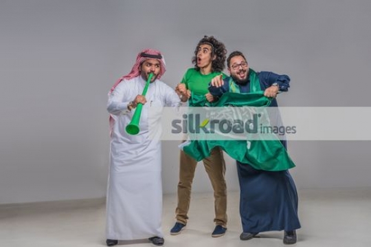 Middle Eastern men celebrating |