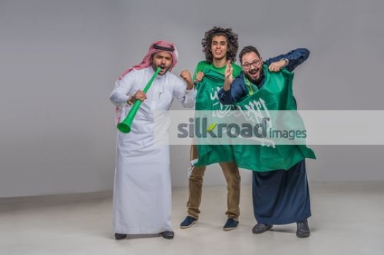 Middle Eastern men celebrating their country|