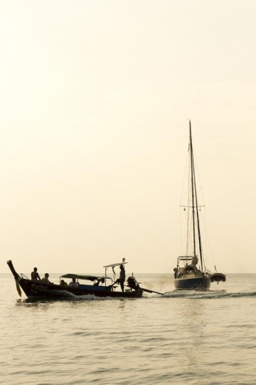 two traditional boat with paddlers