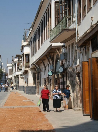 old women in a public road