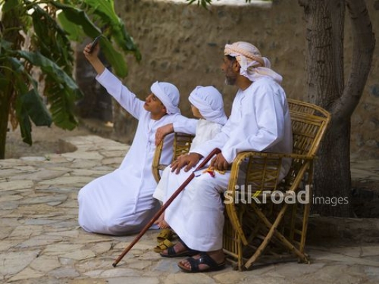Taking selfie with grandfather|-